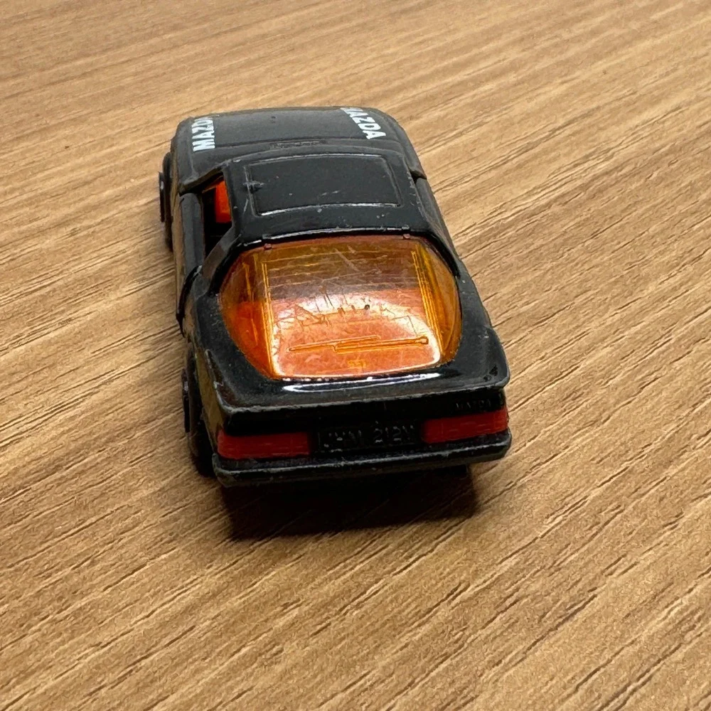 Vintage 1980s matchbox Mazda RX-7 Toy Car Black Diecast Collectible doors open‎